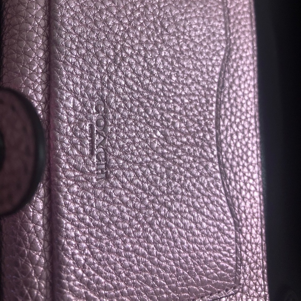 Coach wallet/phonecase/wristlet. Pink metallic.